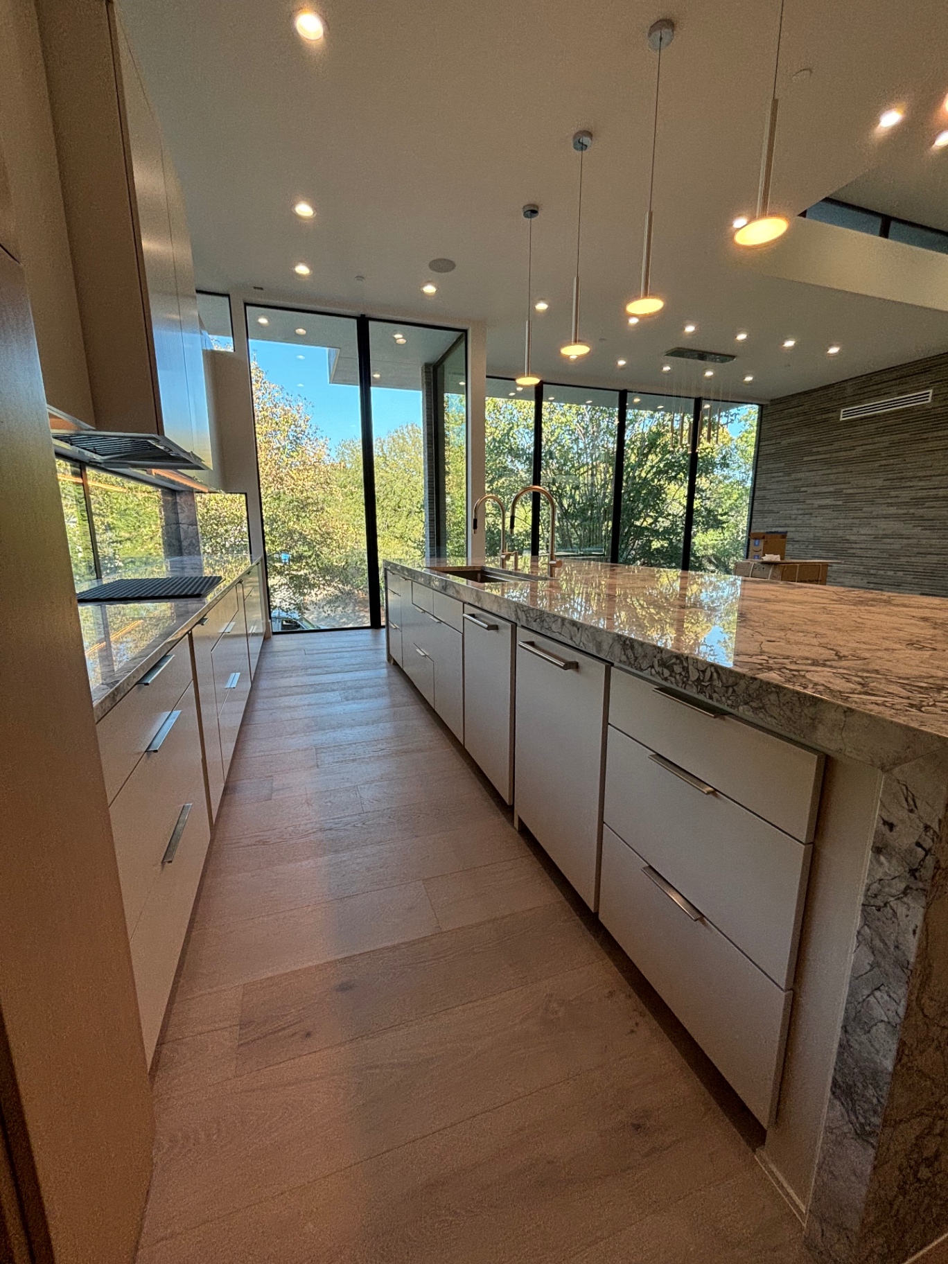 Custom kitchen finished by JJY Painting with flawless cabinetry and trim